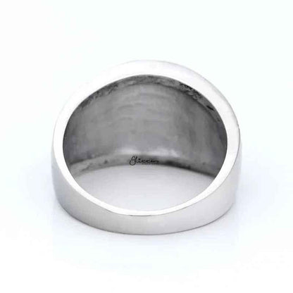 Two-tone stainless steel men's ring with gold claws on a black circle, featuring a bold and modern design.