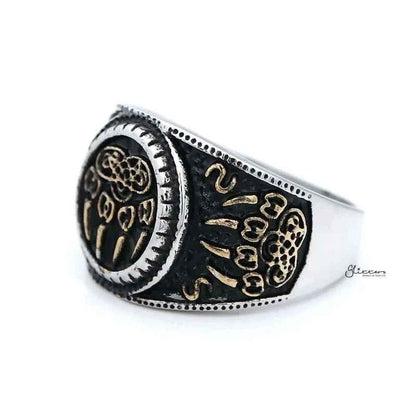 Gold claws on black circle stainless steel men's ring with two-tone finish, stylish and bold jewelry by Glitters.