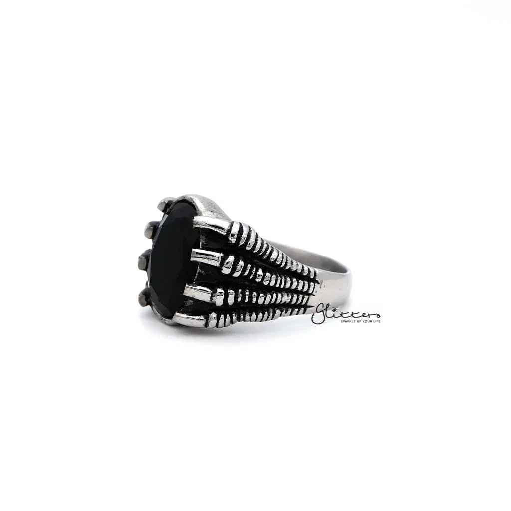 Men's stainless steel ring by Glitters featuring an antiqued claw design with black CZ stone casting.