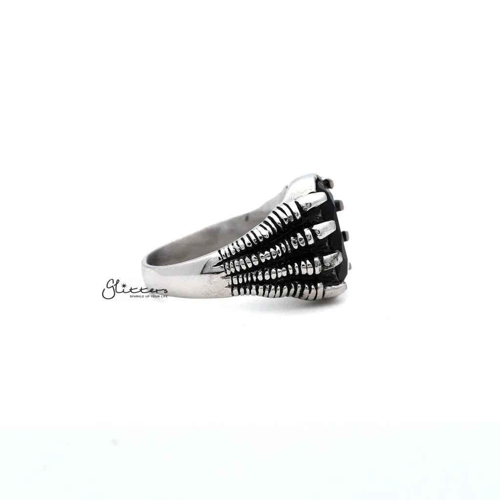 Men's antiqued stainless steel claw ring with black CZ stone, cast by Glitters, showcasing a bold, stylish jewelry design.