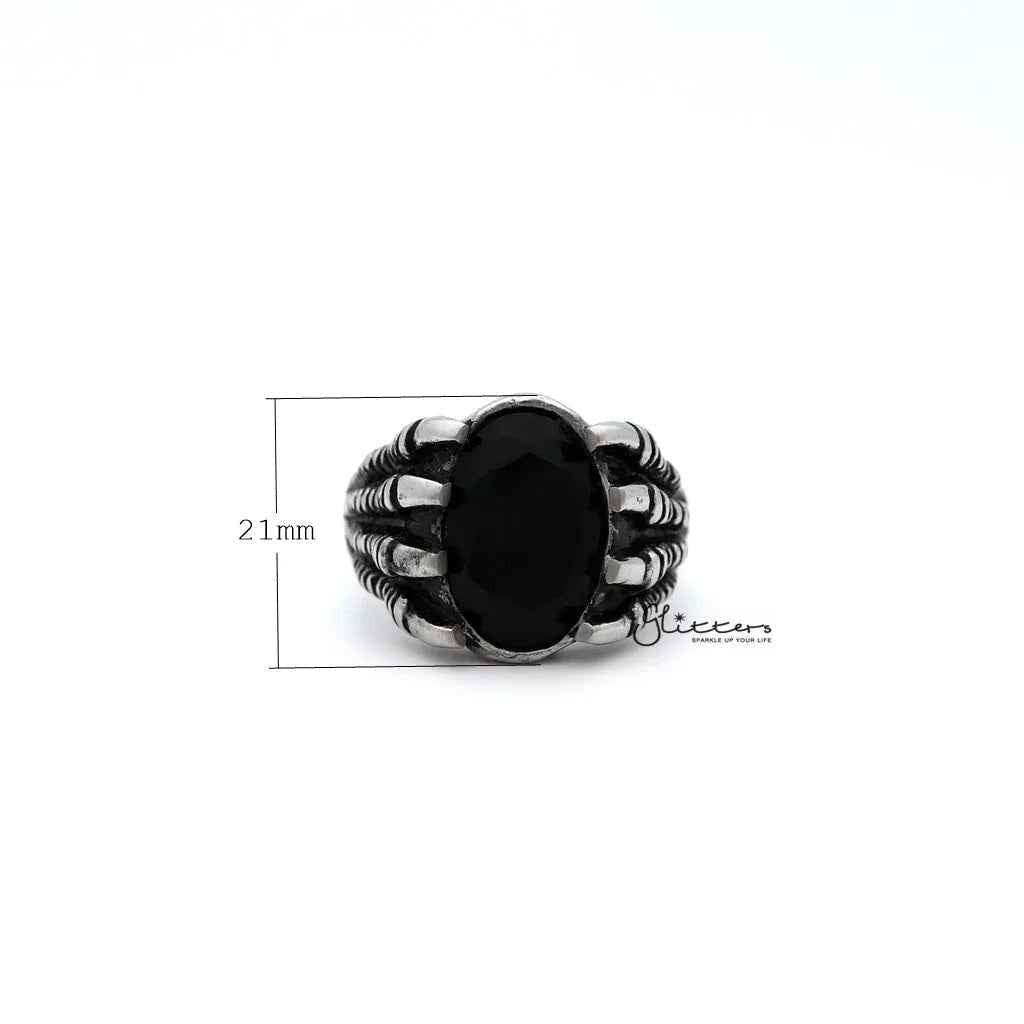 Men's stainless steel ring by Glitters featuring an antiqued finish, black CZ stone claw design and casting details.