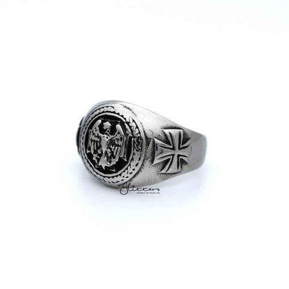 Men's antiqued stainless steel eagle casting rings by Glitters, featuring detailed eagle designs on durable stainless steel bands.