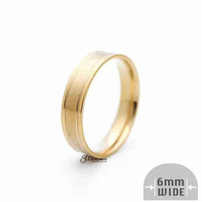 Gold stainless steel ring with a 6mm wide brushed center band, crafted by Glitters, featuring a sleek, modern design.