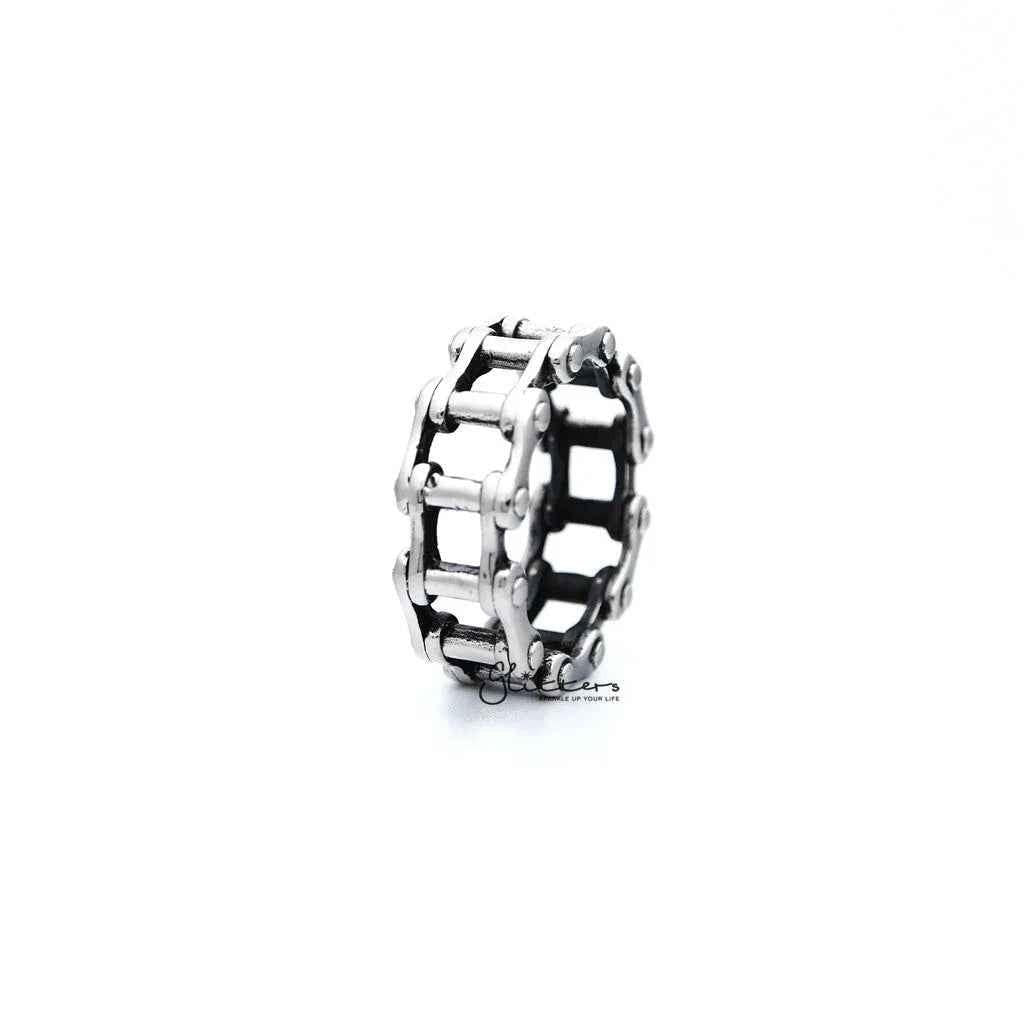 Stainless steel antiqued motorcycle chain casting men's ring by Glitters, featuring rugged, detailed design and polished finish.