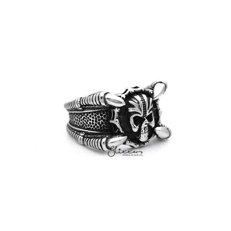 Stainless steel men's ring featuring an antiqued skull head with four claws, crafted by Glitters.