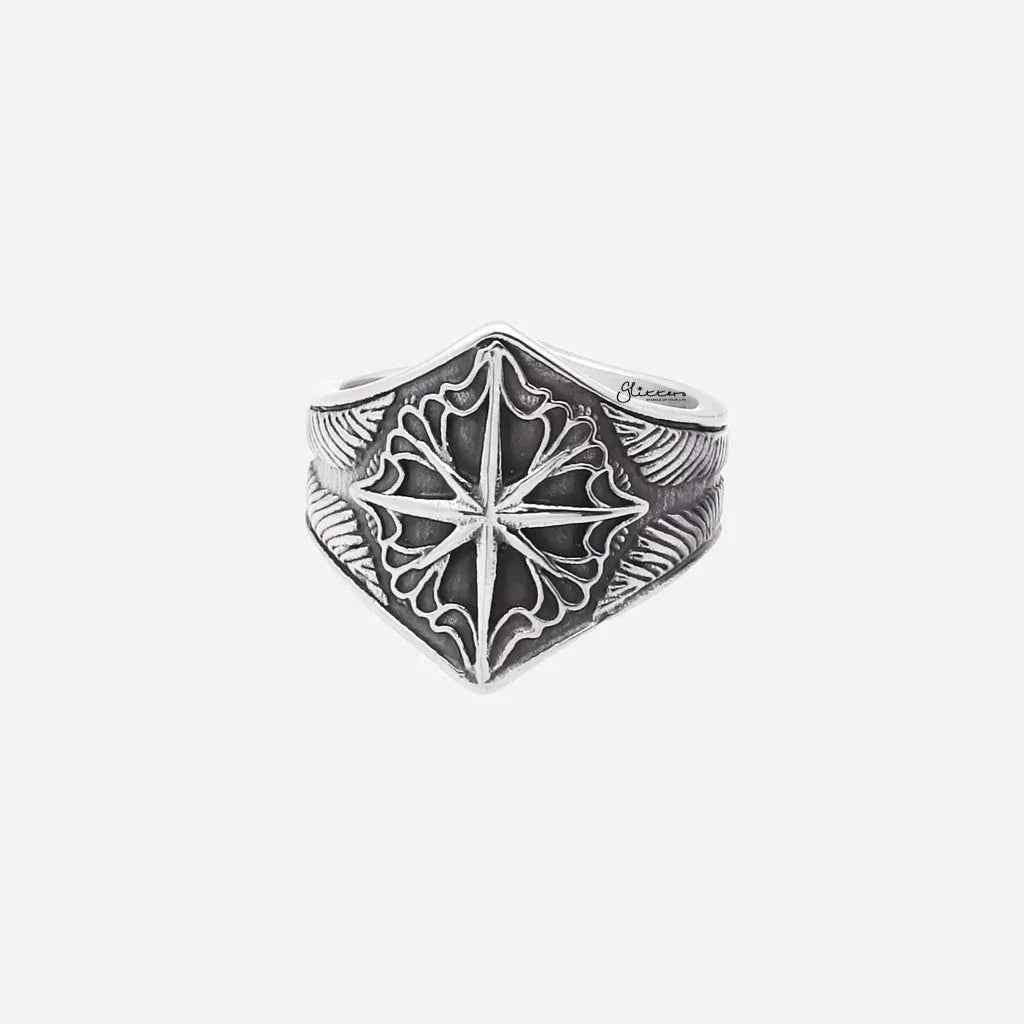 Stainless steel compass ring from Glitters featuring a detailed compass design on a sleek band.
