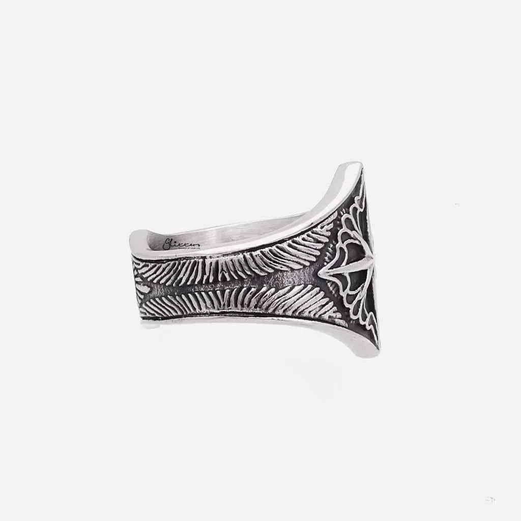 Stainless steel compass ring by Glitters featuring a detailed compass design on a sleek band.