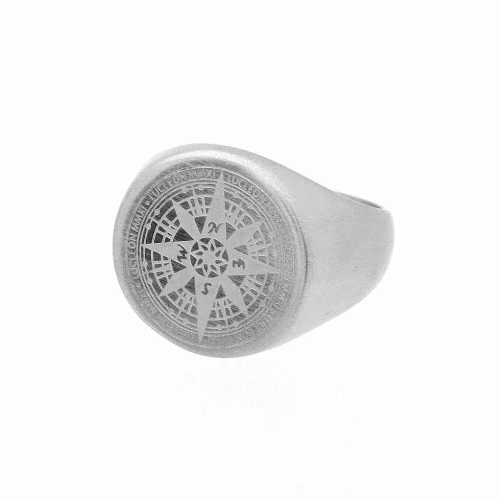 Stainless steel Compass Rose ring by Glitters featuring a detailed compass design on a sleek band.