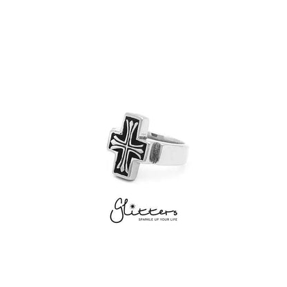 Stainless steel cross cast ring by Glitters featuring a detailed cross design on a smooth band.