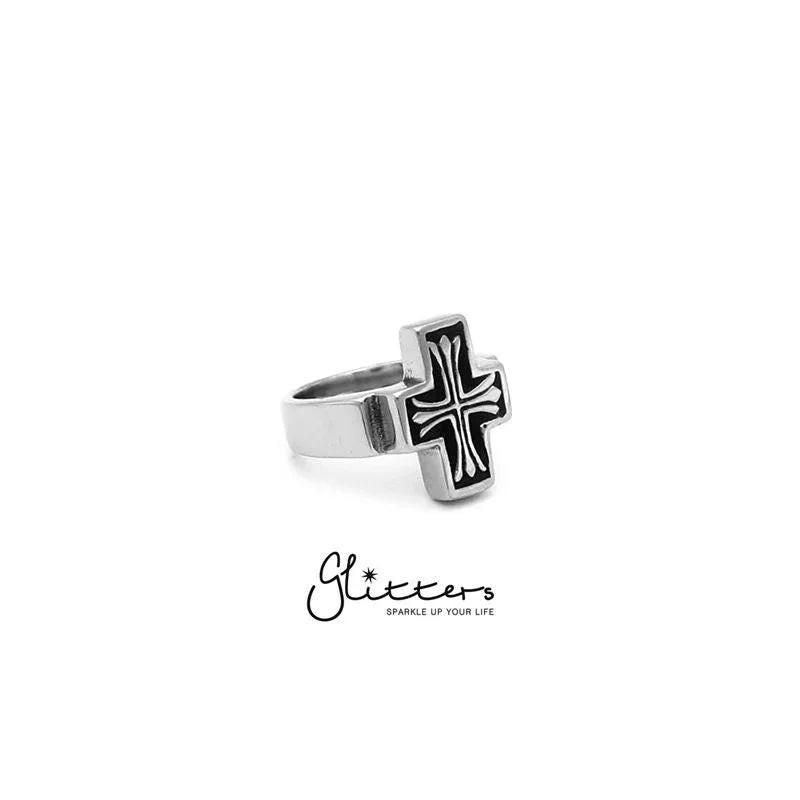 Stainless steel cross cast ring from Glitters featuring a detailed cross design, smooth polished finish, and durable metal construction.