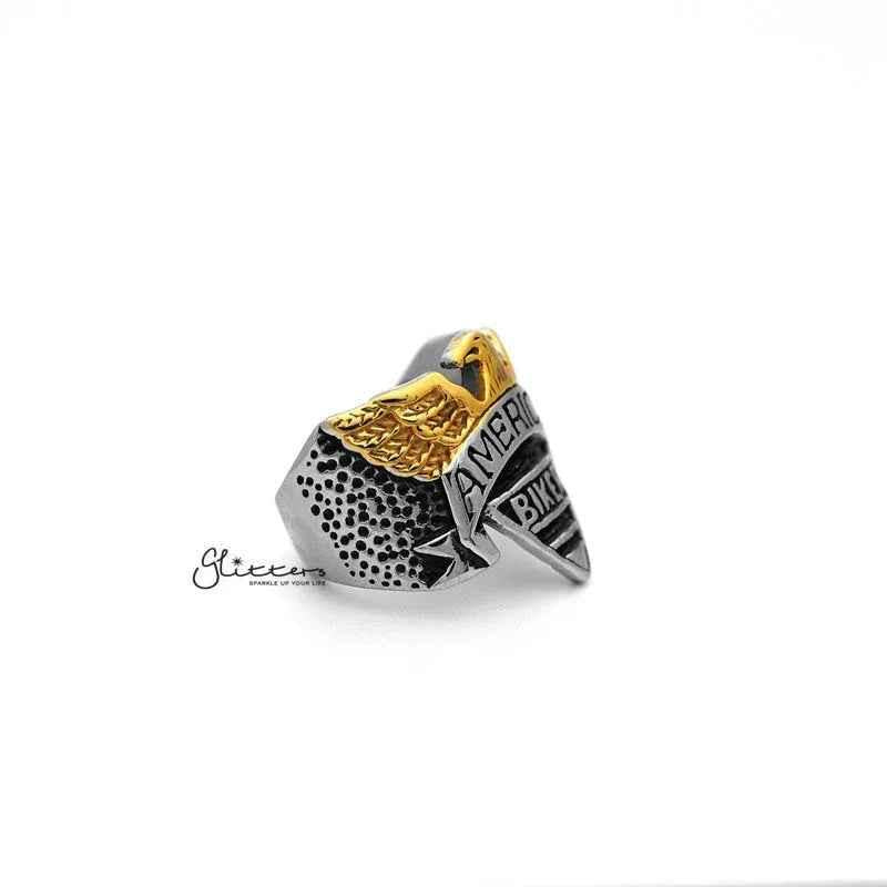 Stainless steel eagle men's ring with "American Biker" casting by Glitters, featuring detailed eagle design and bold style.