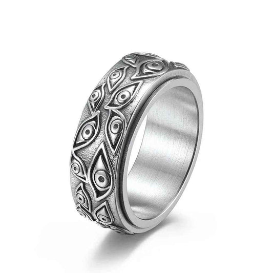 Silver stainless steel Eye Of God spinner ring by Glitters, featuring intricate design and smooth spinning band.