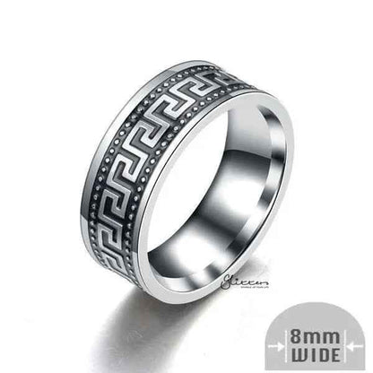 Stainless steel Greek key band ring, 8mm wide, from Glitters, featuring intricate Greek key pattern and smooth polished finish.
