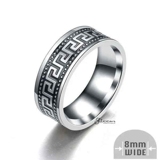 Stainless steel Greek key band ring, 8mm wide, from Glitters, featuring intricate Greek key pattern and smooth polished finish.