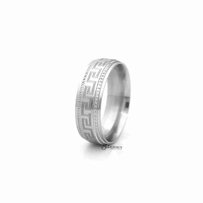 Stainless steel Greek key pattern band ring by Glitters, featuring intricate geometric design on smooth metal surface.