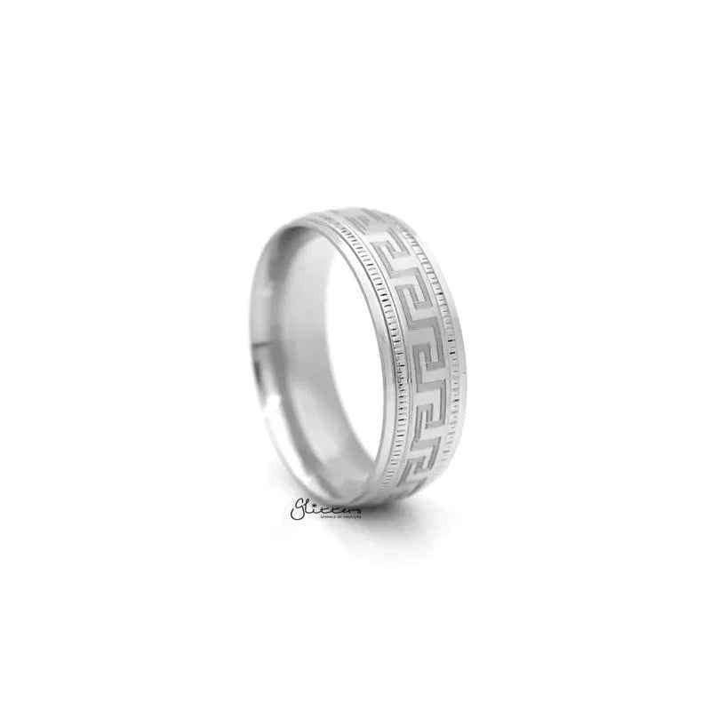 Stainless steel Greek key pattern band ring by Glitters, featuring intricate geometric design on smooth metallic surface.