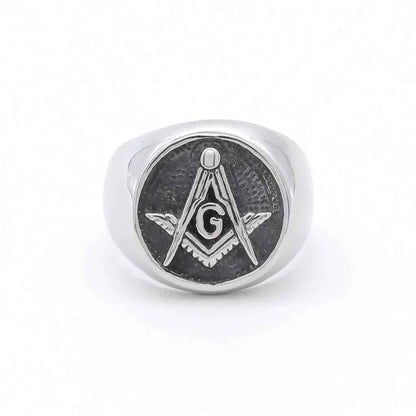Stainless Steel Masonic Ring by Glitters featuring intricate engraved symbols on a polished silver-tone band.
