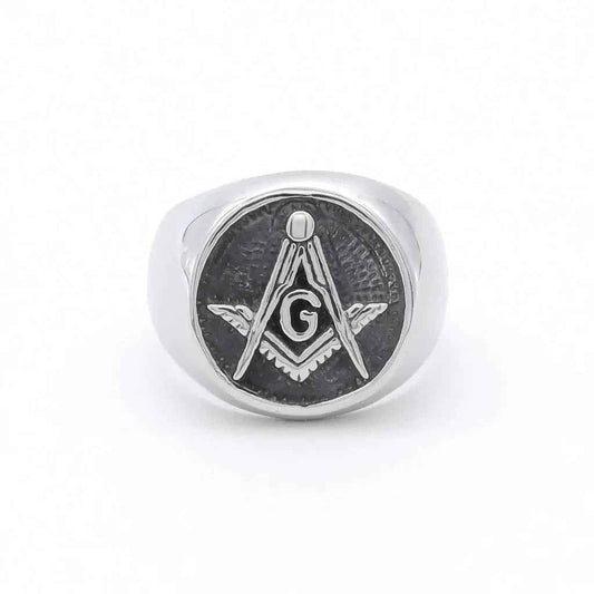 Stainless Steel Masonic Ring by Glitters featuring intricate engraved symbols on a polished silver-tone band.