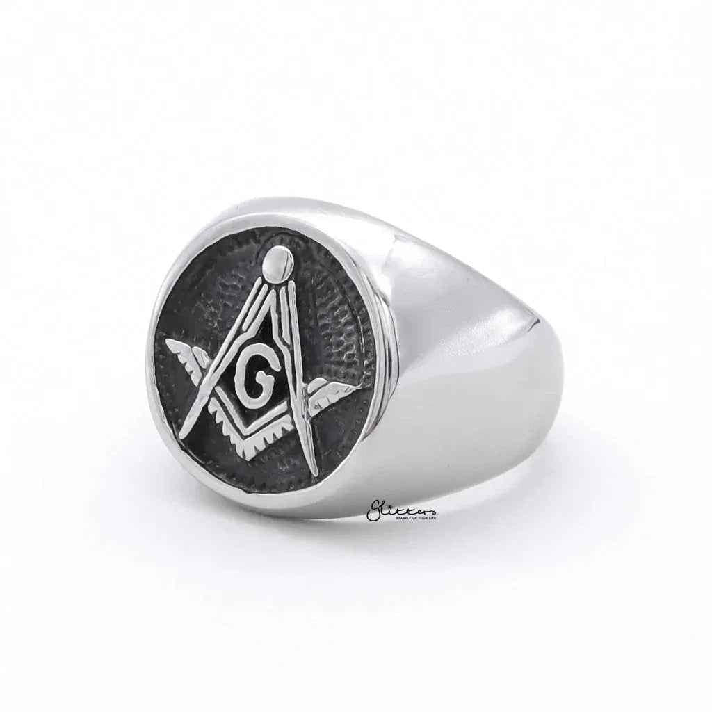 Stainless steel Masonic ring by Glitters featuring engraved symbols and a polished finish, designed for men and women.