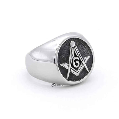 Stainless steel Masonic ring with engraved symbols, designed by Glitters, showcasing detailed craftsmanship and a polished finish.