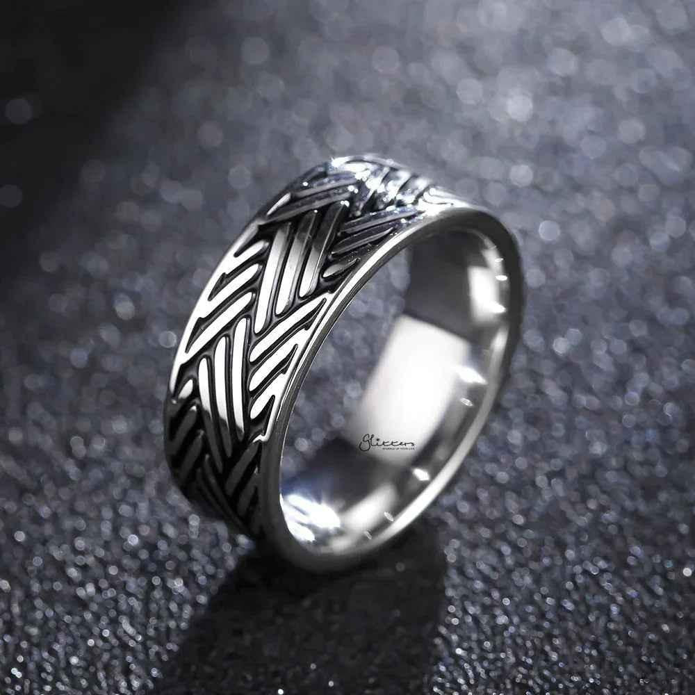 Stainless steel multi-line band ring by Glitters, featuring a sleek, modern design with multiple layered lines for a stylish look.