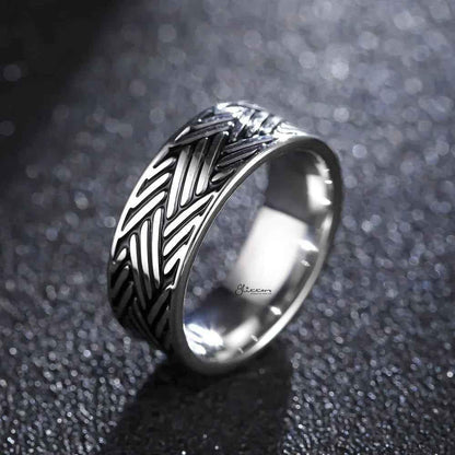 Stainless steel multi-line band ring by Glitters, featuring a sleek, modern design with multiple layered lines for a stylish look.
