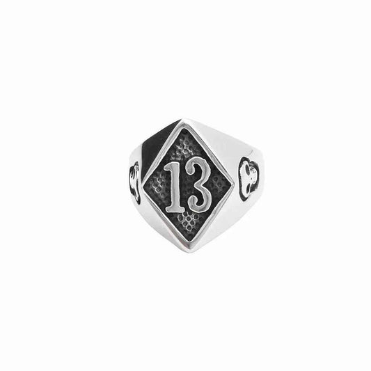 Stainless steel Number 13 and skulls ring by Glitters featuring engraved numerals and skull motifs.