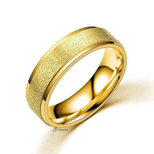 Stainless steel band ring with a gold sandblasted finish, showcasing a sleek, matte texture and modern design by Glitters.