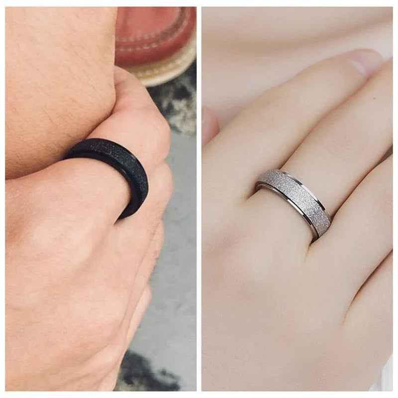 Stainless steel band ring with a sandblasted finish in silver, featuring a sleek, modern design from Glitters.