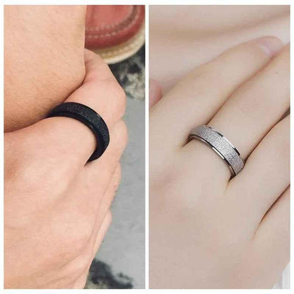 Stainless steel band ring with a sandblasted finish in silver, featuring a sleek, modern design from Glitters.