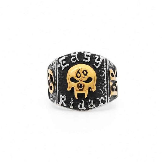 Stainless steel skull ring from Glitters featuring a detailed skull design on a sleek band.
