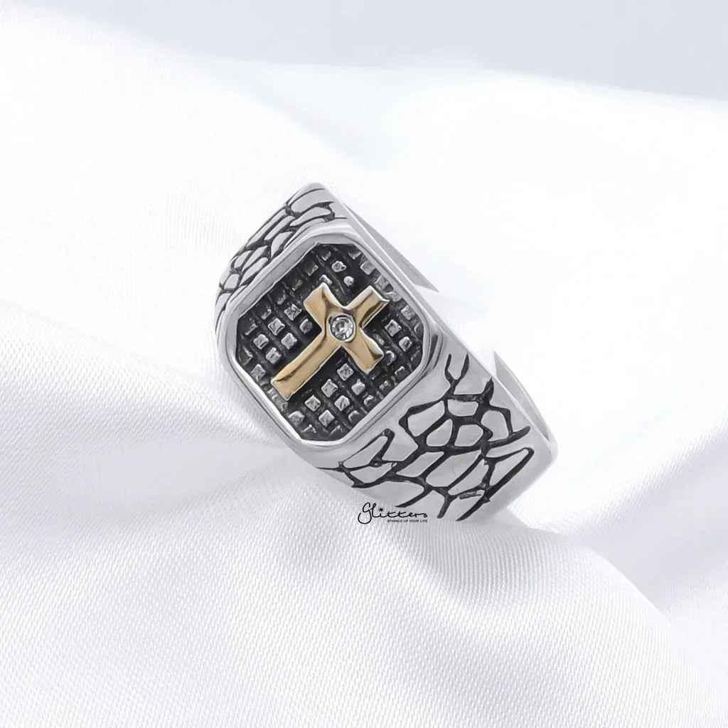 Stainless steel two-tone cross ring by Glitters, featuring a polished cross design on a sleek stainless steel band.