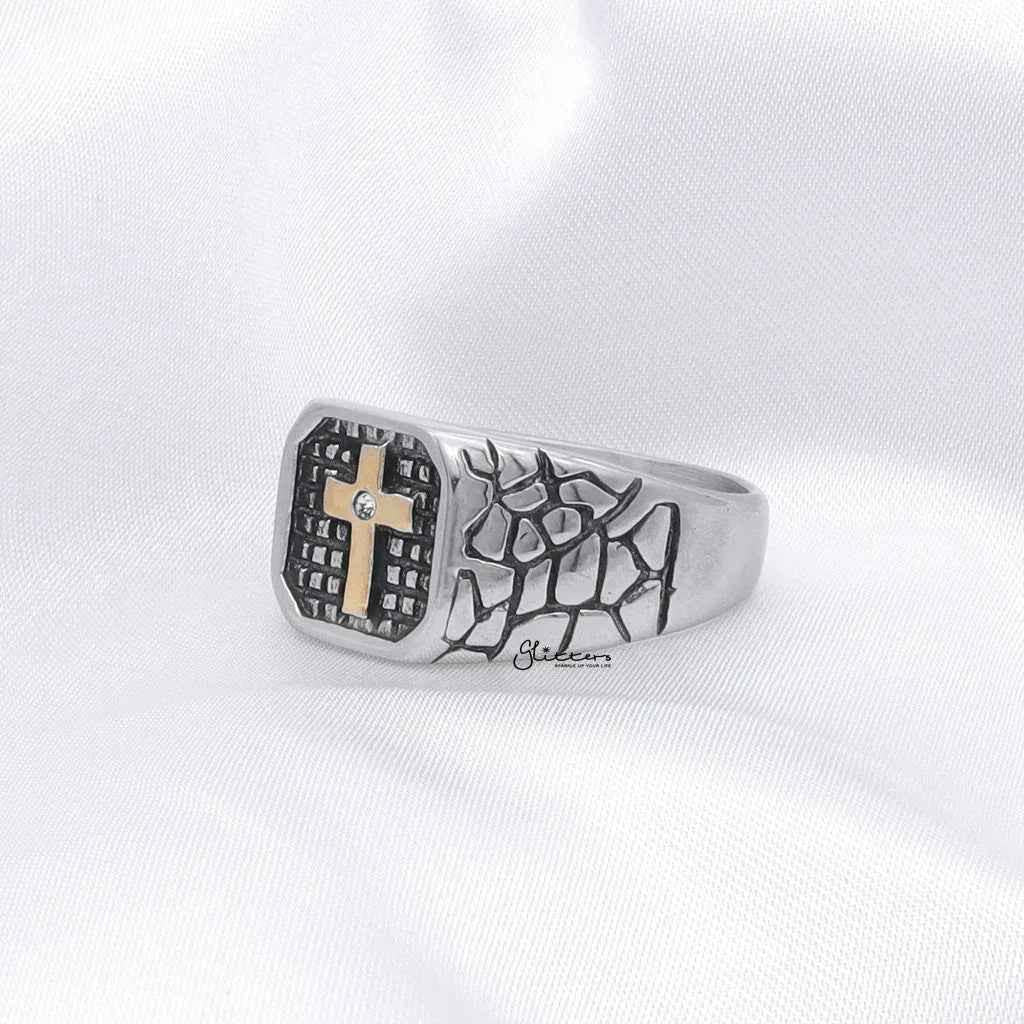 Stainless steel two-tone cross ring by Glitters featuring a polished cross design on a sleek band.