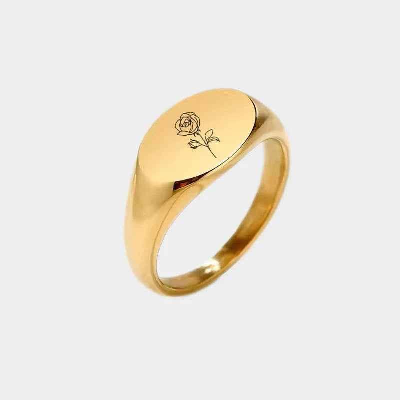 Personalised stainless steel oval signet ring by Glitters, featuring a sleek silver design and smooth polished surface.