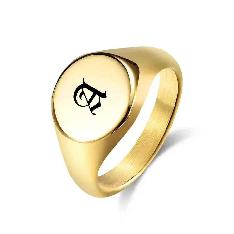 Personalised stainless steel round signet ring by Glitters, showcasing a sleek silver band with customizable engraved design.