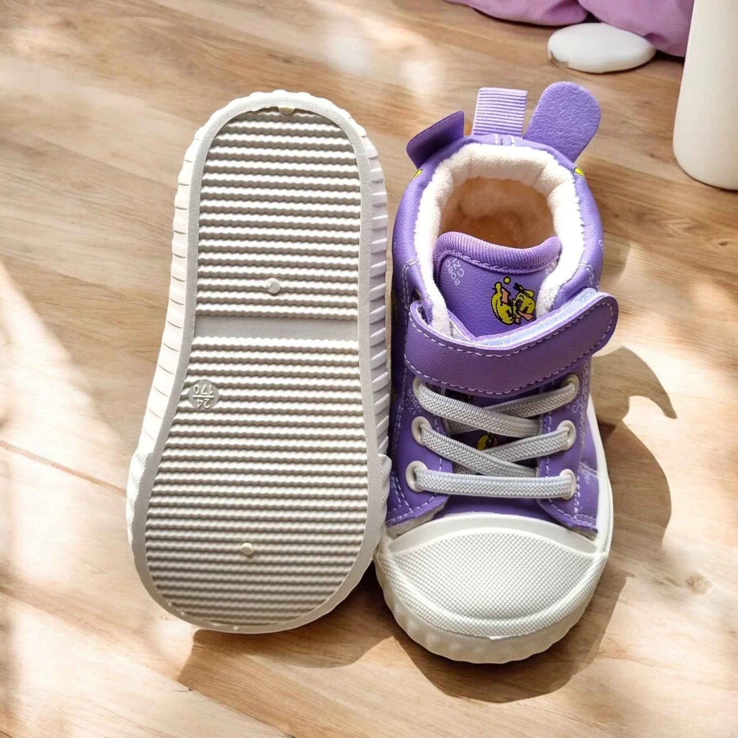 Happy Feet NZ plush high-top shoes in soft, secure, and playful design, featuring colorful fabric and comfortable padding.
