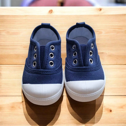 Happy Feet NZ Tiny Trail Canvas shoes, classic, easy to wear, durable, and fuss-free children's footwear displayed outdoors.