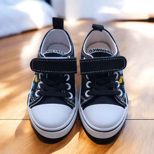 Colorful DinoTeam Canvas Sneakers by Happy Feet NZ featuring vibrant print and comfortable design for kids.