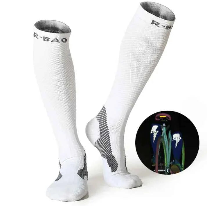 Blue professional long compression socks by Mead's Supply & Equipment for running and cycling, made of 72% nylon athletic support.