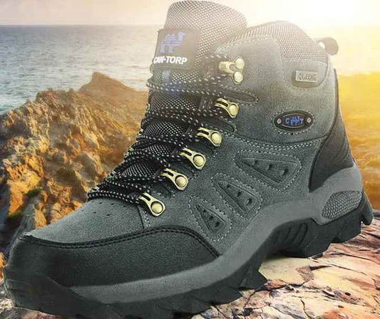 Brown and orange unisex high-top waterproof hiking shoes by Mead's Supply & Equipment Outfitters for all-terrain outdoor trails.