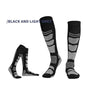 Dark grey and black over-the-knee wool hiking socks by Mead's Supply & Equipment for outdoor adventures and trail walking.
