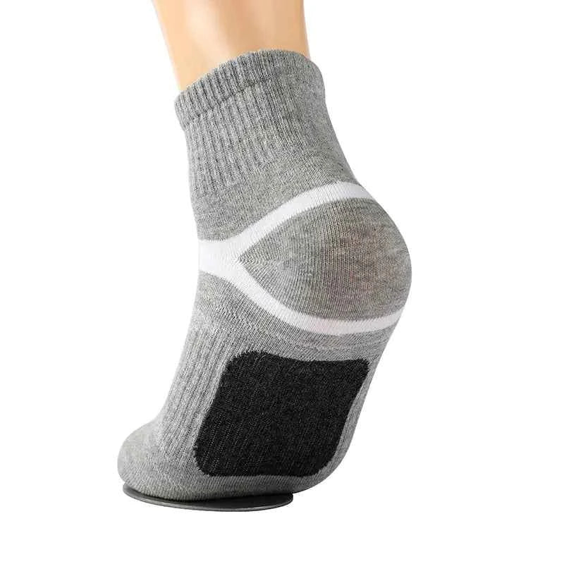 Light gray men's outdoor sports socks by Mead's Supply & Equipment Outfitters, durable 75% cotton crew socks for hiking and basketball.