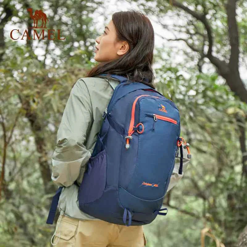 Camel outdoor backpack by Mead's Supply & Equipment Outfitters, 40L hiking and camping backpack in green with multiple compartments.