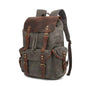 Black waxed canvas computer travel bag with leather accents, Mead's Supply & Equipment Outfitters 20-35L laptop backpack for work and school.