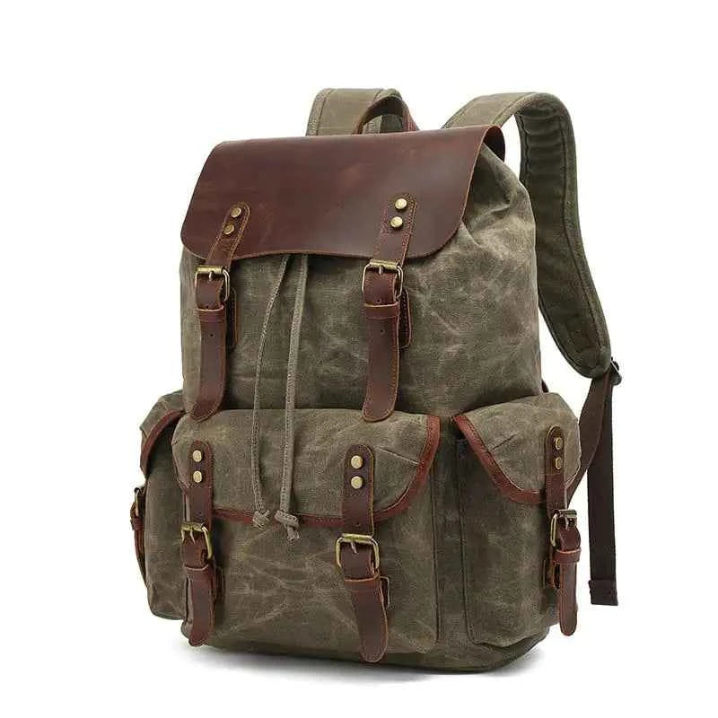 Waxed canvas computer travel backpack with leather accents by Mead's Supply & Equipment Outfitters, 20-35L laptop bag for work and school.