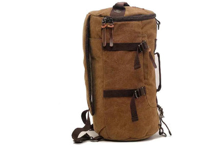 Brown 50L Canvas Hiking Backpack by Mead's Supply & Equipment Outfitters with retro style, leather accents, men's outdoor travel rucksack