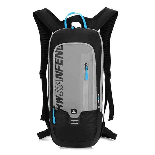 Gray outdoor hydration backpack with integrated water bladder, lightweight cycling and trail running pack by Mead's Supply & Equipment.