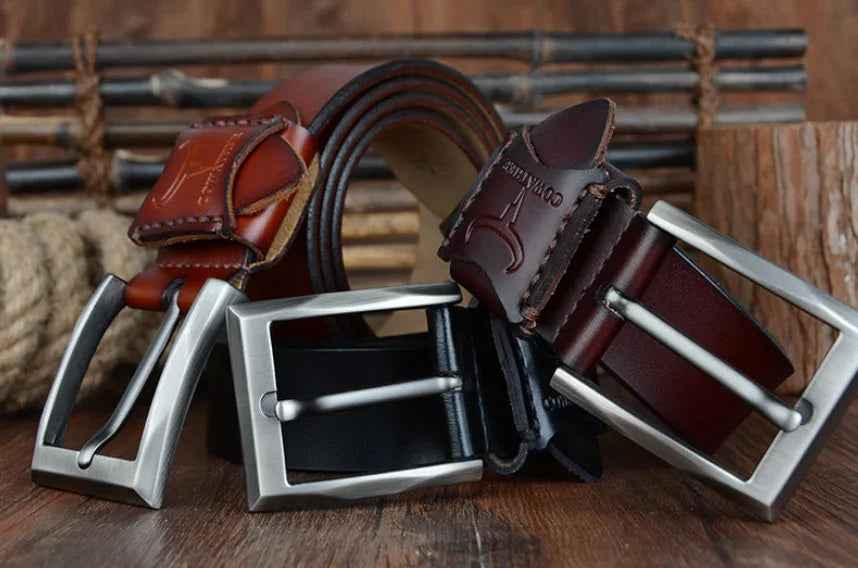 Black genuine leather men's casual and business belt, 100cm, from Mead's Supply & Equipment Outfitters, with a sleek buckle design.