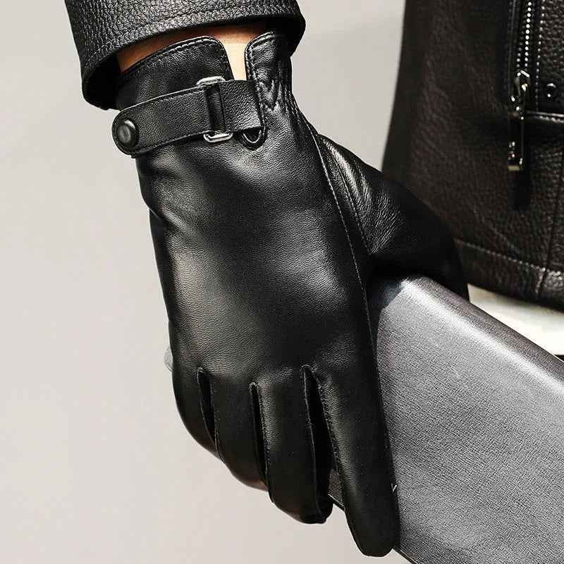Black leather gloves with velvet lining from Mead's Supply & Equipment Outfitters, showing the detailed stitching and smooth leather texture.