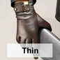 Black leather gloves with velvet lining from Mead's Supply & Equipment Outfitters, showcasing a snug fit and smooth leather texture.